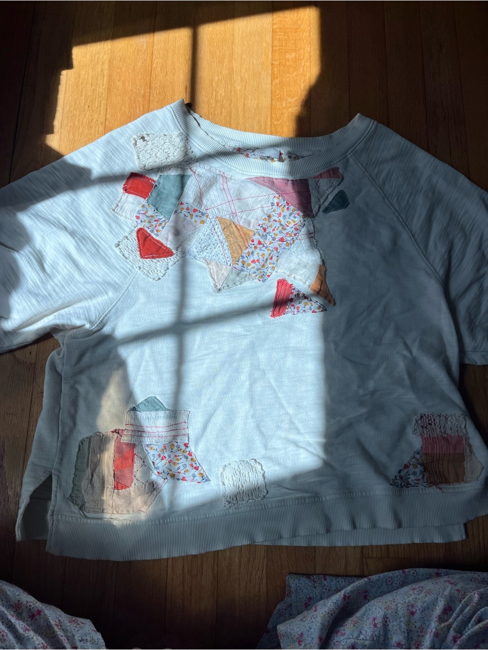 Anthropologie patchwork sweatshirt tee